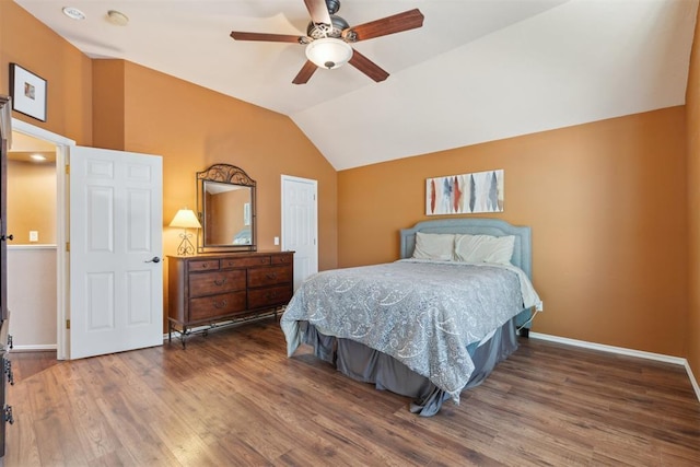 12525 S Youngs Pl, Oklahoma City, OK 73170 - bedroom with wood finished floors, vaulted ceiling, baseboards, and ceiling fan