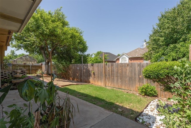 12525 S Youngs Pl, Oklahoma City, OK 73170 - fenced backyard featuring a patio