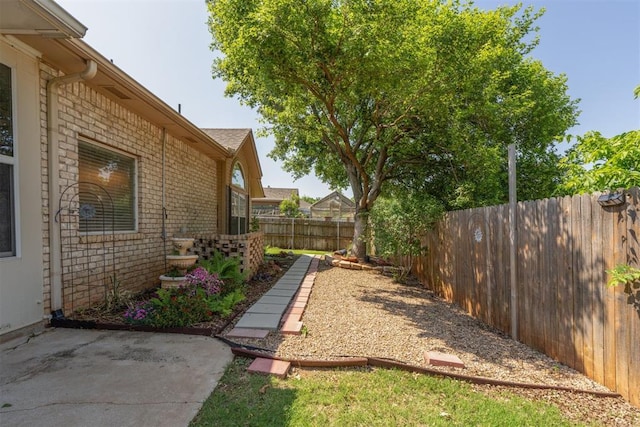 12525 S Youngs Pl, Oklahoma City, OK 73170 - fenced backyard with a patio