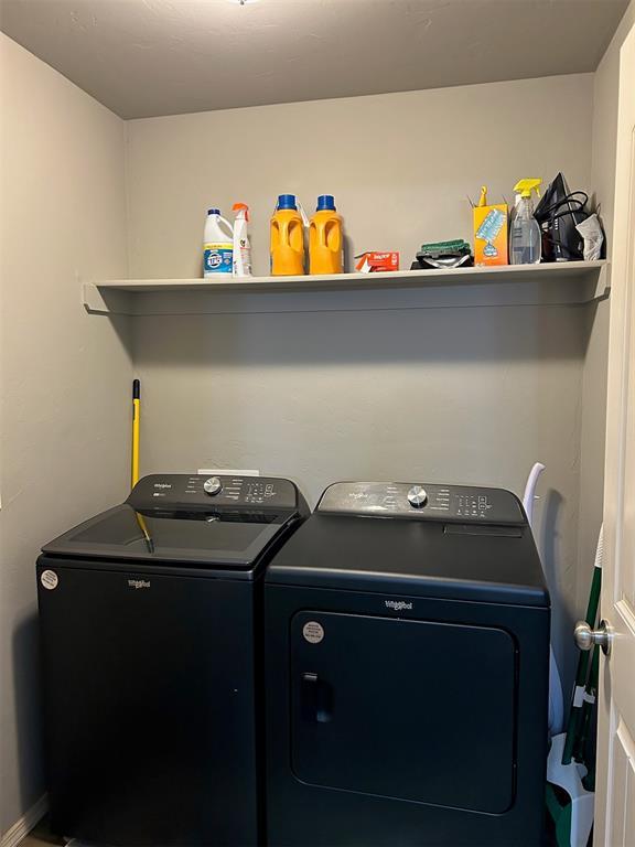 9525 SW 27th St, Oklahoma City, OK 73128 - laundry area with separate washer and dryer