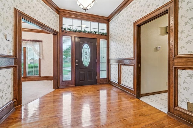 8 Brentwood Pl, Shawnee, OK 74804 - entryway with wallpapered walls, light wood-style flooring, and ornamental molding