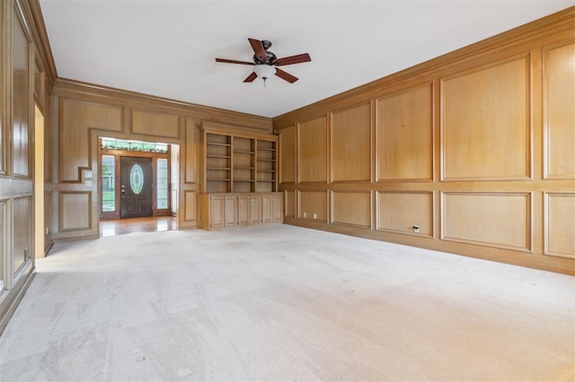 8 Brentwood Pl, Shawnee, OK 74804 - unfurnished room with a decorative wall, ceiling fan, light colored carpet, and ornamental molding