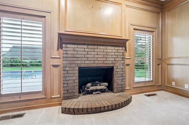 8 Brentwood Pl, Shawnee, OK 74804 - detailed view of a fireplace, carpet, and baseboards