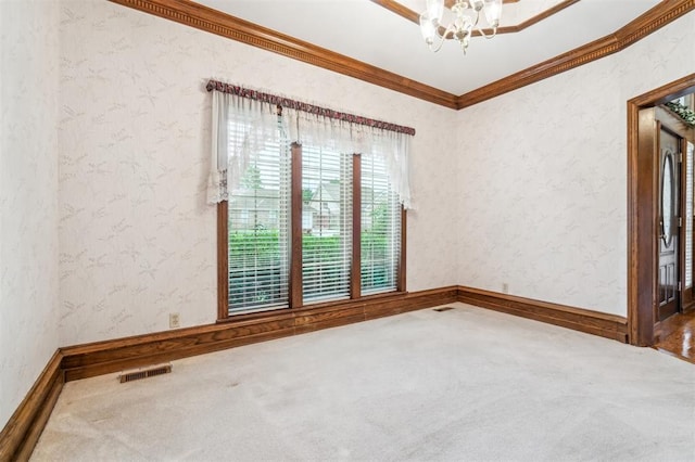 8 Brentwood Pl, Shawnee, OK 74804 - unfurnished room with carpet, crown molding, and a chandelier
