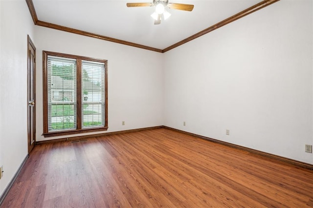 8 Brentwood Pl, Shawnee, OK 74804 - unfurnished room with wood finished floors, a ceiling fan, ornamental molding, and baseboards