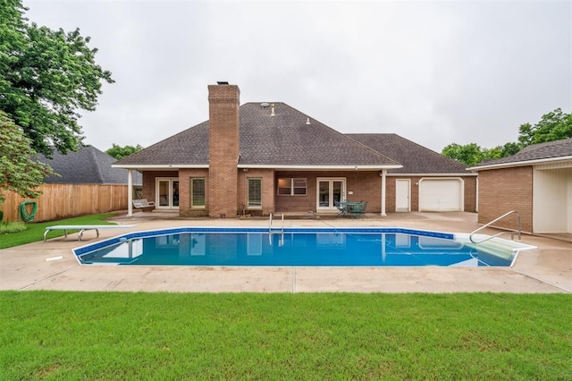 8 Brentwood Pl, Shawnee, OK 74804 - view of pool with french doors, a patio, and a diving board