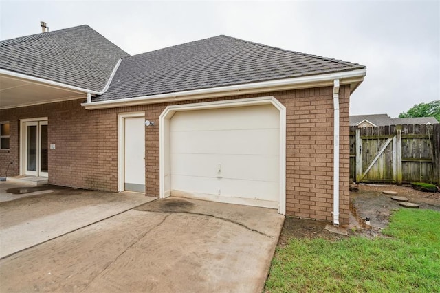 8 Brentwood Pl, Shawnee, OK 74804 - garage featuring driveway