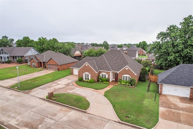 8 Brentwood Pl, Shawnee, OK 74804 - traditional home featuring driveway, a front lawn, a residential view, and roof with shingles