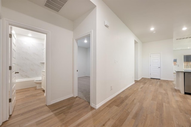 2836 NW 28th St, Yukon, OK 73099 - hall with light wood-type flooring, recessed lighting, and baseboards