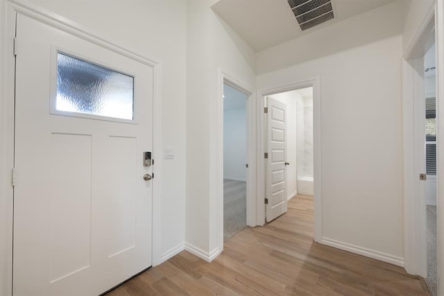 2836 NW 28th St, Yukon, OK 73099 - entryway featuring light wood-style flooring and baseboards