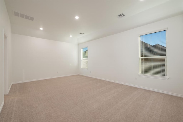 2836 NW 28th St, Yukon, OK 73099 - empty room featuring light carpet, baseboards, and recessed lighting