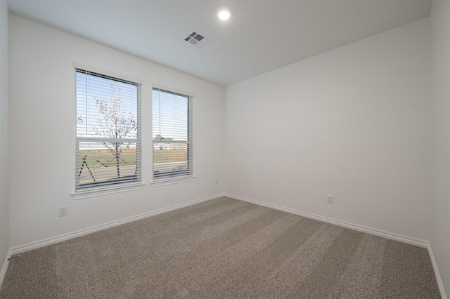 2836 NW 28th St, Yukon, OK 73099 - carpeted empty room featuring baseboards and recessed lighting