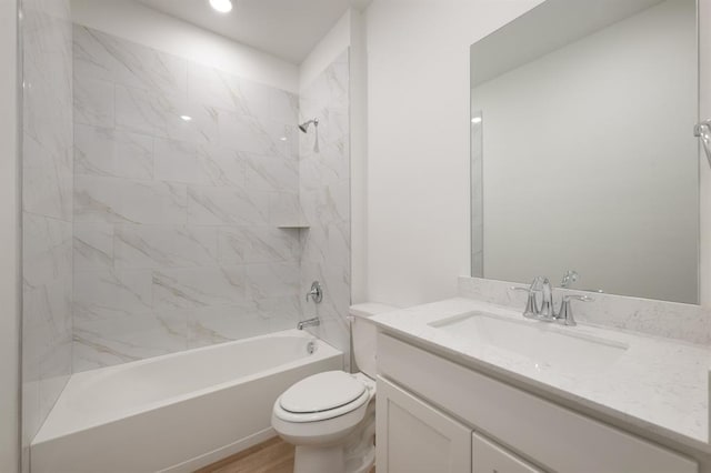 2836 NW 28th St, Yukon, OK 73099 - full bath featuring toilet, bathing tub / shower combination, vanity, and wood finished floors