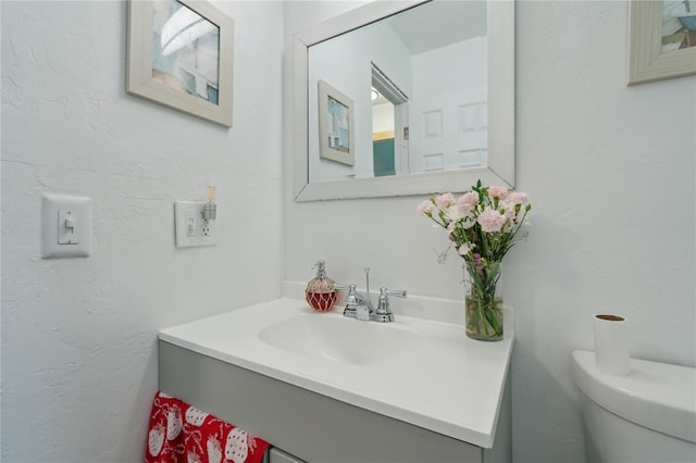 4301 NW 18th St, Oklahoma City, OK 73107 - bathroom featuring vanity and toilet