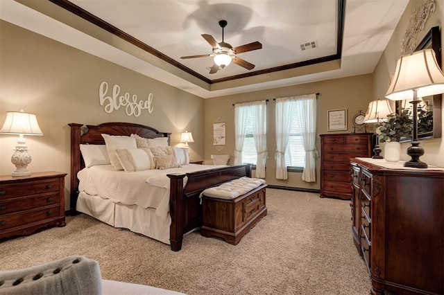 2139 Rivanna Way, Edmond, OK 73034 - bedroom with a raised ceiling, light colored carpet, ornamental molding, and a ceiling fan
