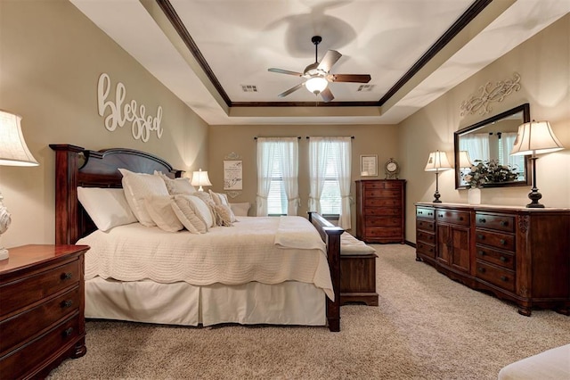 2139 Rivanna Way, Edmond, OK 73034 - bedroom featuring a raised ceiling, light carpet, crown molding, and ceiling fan