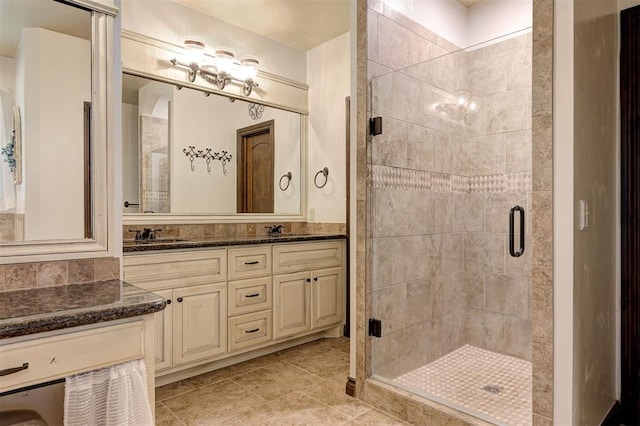 2139 Rivanna Way, Edmond, OK 73034 - bathroom featuring double vanity, a stall shower, and tile patterned flooring