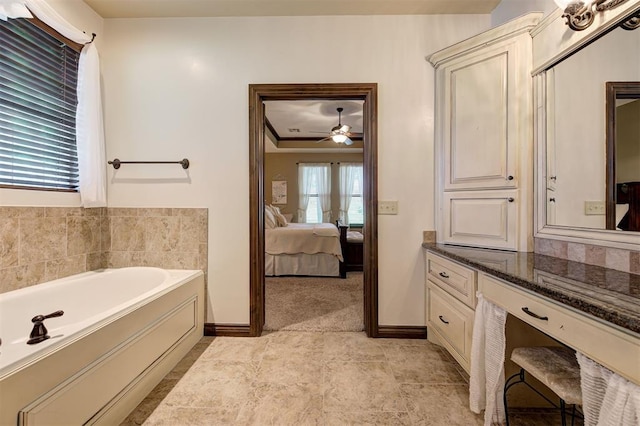 2139 Rivanna Way, Edmond, OK 73034 - ensuite bathroom with a bath, ceiling fan, and vanity
