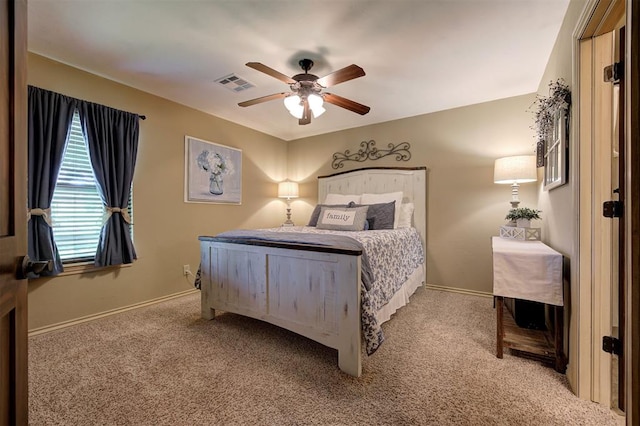 2139 Rivanna Way, Edmond, OK 73034 - bedroom with light colored carpet and ceiling fan