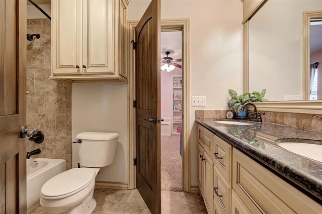 2139 Rivanna Way, Edmond, OK 73034 - bathroom with double vanity, a ceiling fan, tile patterned floors, and shower / tub combination