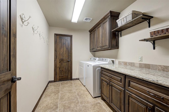 2139 Rivanna Way, Edmond, OK 73034 - washroom with cabinet space and independent washer and dryer