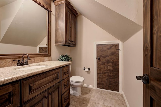 2139 Rivanna Way, Edmond, OK 73034 - bathroom featuring vanity and lofted ceiling