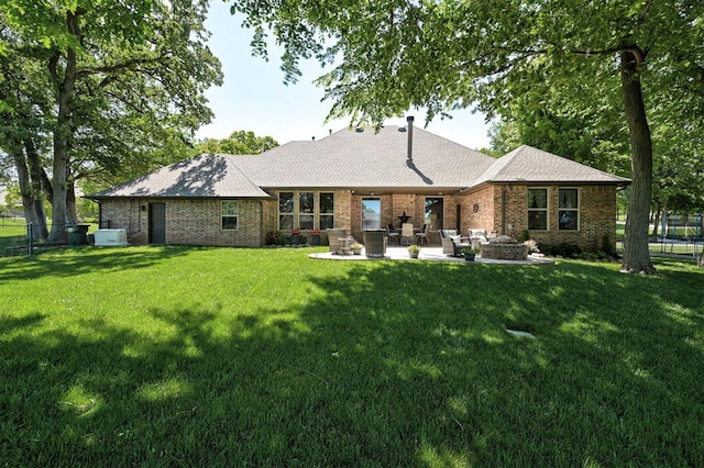 2139 Rivanna Way, Edmond, OK 73034 - rear view of property featuring a patio area and brick siding