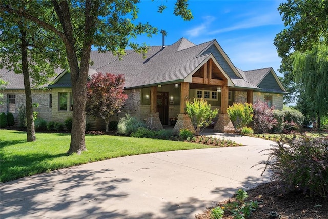 1516 Brook Bank Dr, Jones, OK 73049 - craftsman-style house featuring stone siding, a front lawn, and a shingled roof