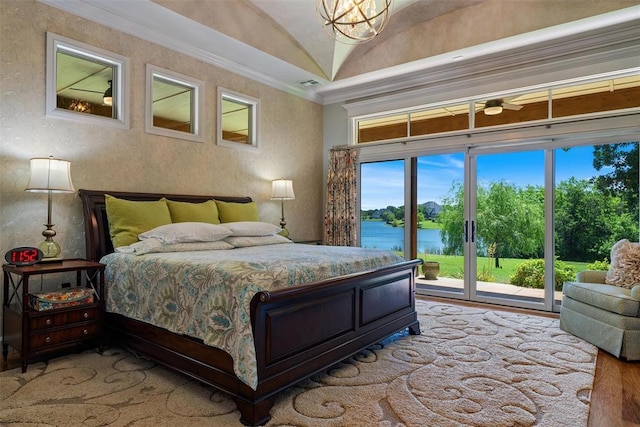 1516 Brook Bank Dr, Jones, OK 73049 - bedroom featuring a water view, access to exterior, wood finished floors, crown molding, and multiple windows