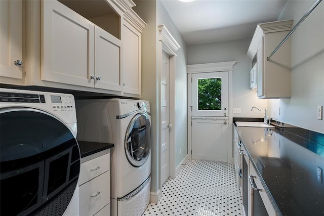 1516 Brook Bank Dr, Jones, OK 73049 - laundry area featuring cabinet space, washing machine and clothes dryer, light flooring, and baseboards