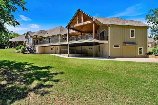 1516 Brook Bank Dr, Jones, OK 73049 - back of property featuring board and batten siding, stairs, a yard, a patio area, and a wooden deck