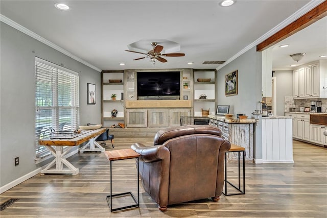 2336 County Road 1222, Blanchard, OK 73010 - living room with ornamental molding, a ceiling fan, light wood-style flooring, recessed lighting, and baseboards