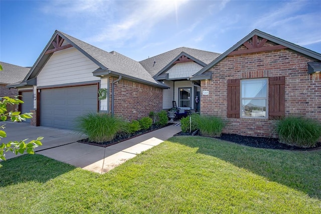 1225 N Nature Way, Mustang, OK 73064 - view of front of property featuring brick siding, concrete driveway, an attached garage, a front lawn, and a shingled roof