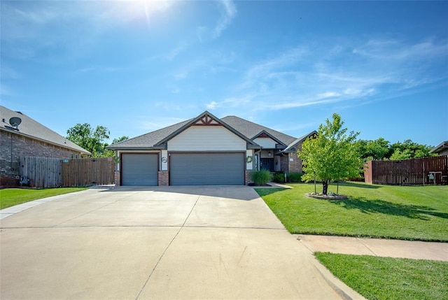 1225 N Nature Way, Mustang, OK 73064 - view of front of property featuring a garage, driveway, and brick siding