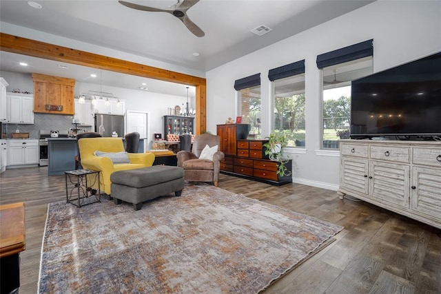 1225 N Nature Way, Mustang, OK 73064 - living room featuring a ceiling fan, dark wood-style floors, recessed lighting, and baseboards