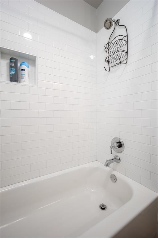 1225 N Nature Way, Mustang, OK 73064 - bathroom featuring bathtub / shower combination
