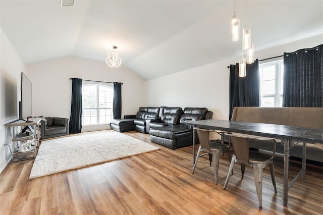 2304 NW 196th Ter, Edmond, OK 73012 - living room with light wood finished floors and lofted ceiling