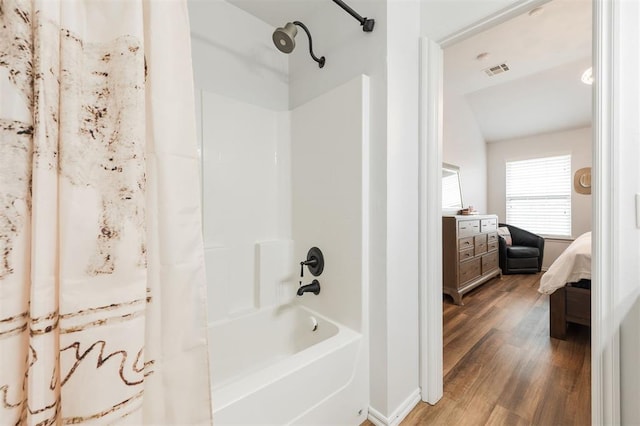2304 NW 196th Ter, Edmond, OK 73012 - full bath featuring shower / tub combo, wood finished floors, and connected bathroom