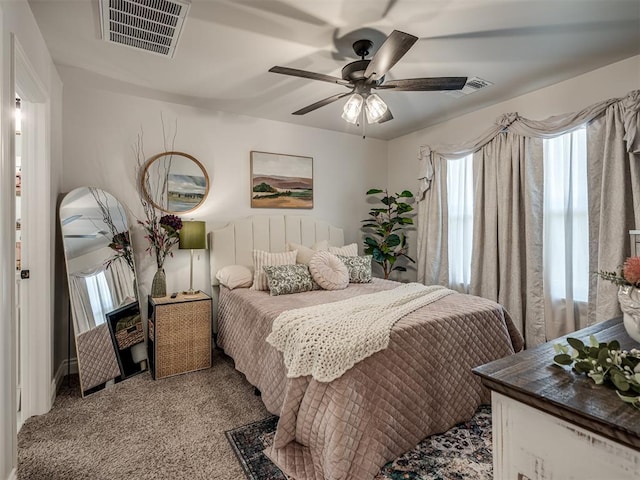 13325 SW 5th St, Yukon, OK 73099 - bedroom with light carpet and ceiling fan