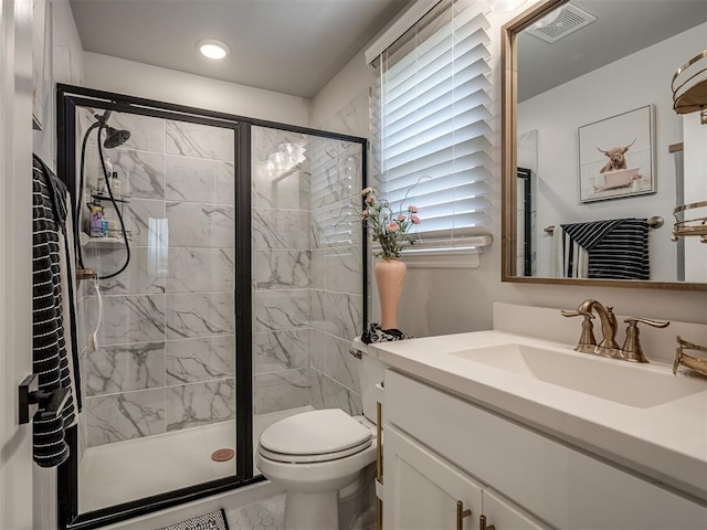 13325 SW 5th St, Yukon, OK 73099 - bathroom featuring vanity, a stall shower, toilet, and recessed lighting