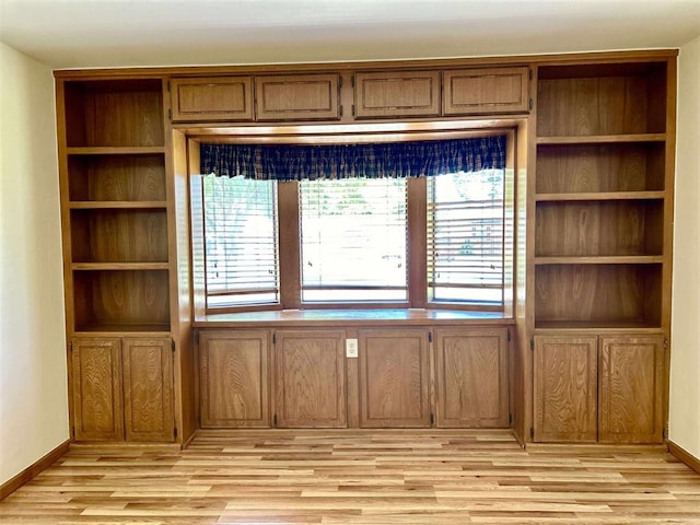1312 N Carol Ln, Oklahoma City, OK 73127 - unfurnished dining area featuring light wood finished floors and baseboards