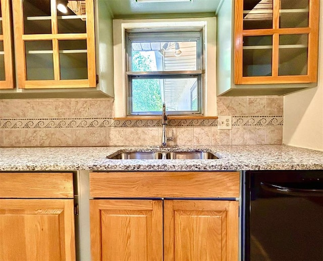 1312 N Carol Ln, Oklahoma City, OK 73127 - kitchen with a sink, dishwasher, glass insert cabinets, and decorative backsplash