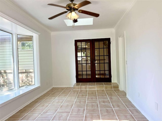 1312 N Carol Ln, Oklahoma City, OK 73127 - unfurnished room with french doors, ornamental molding, a ceiling fan, and light tile patterned floors