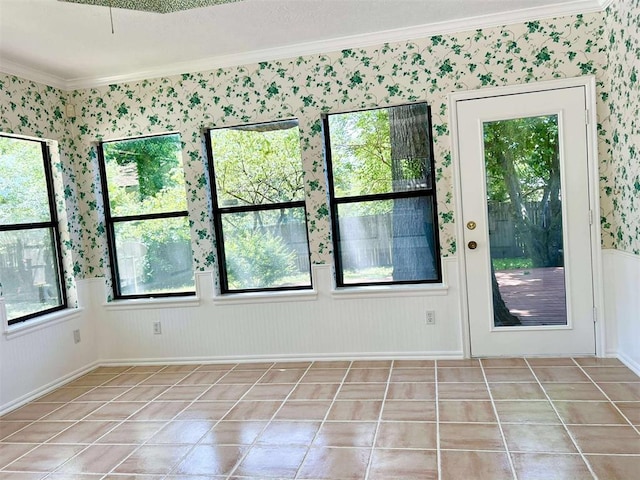 1312 N Carol Ln, Oklahoma City, OK 73127 - empty room with wallpapered walls and crown molding