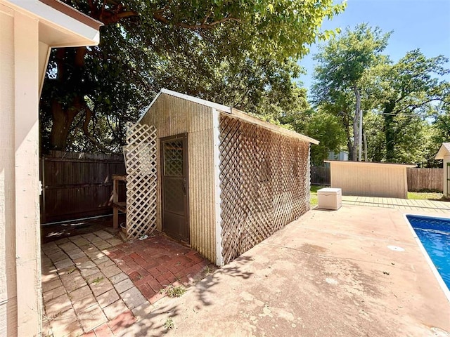 1312 N Carol Ln, Oklahoma City, OK 73127 - fenced backyard with a patio area