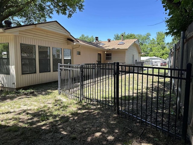 1312 N Carol Ln, Oklahoma City, OK 73127 - back of property featuring a fenced backyard