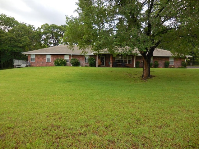 1889 Cobblestone Rd, Sulphur, OK 73086 - view of front of house featuring brick siding and a front lawn