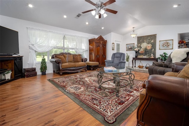 1889 Cobblestone Rd, Sulphur, OK 73086 - living area featuring lofted ceiling, wood finished floors, a ceiling fan, and recessed lighting