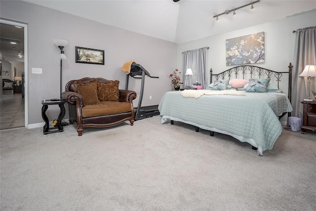 1889 Cobblestone Rd, Sulphur, OK 73086 - carpeted bedroom featuring vaulted ceiling, baseboards, and rail lighting