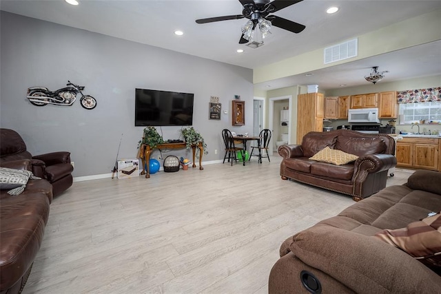 1889 Cobblestone Rd, Sulphur, OK 73086 - living area with baseboards, light wood-style floors, recessed lighting, and a ceiling fan